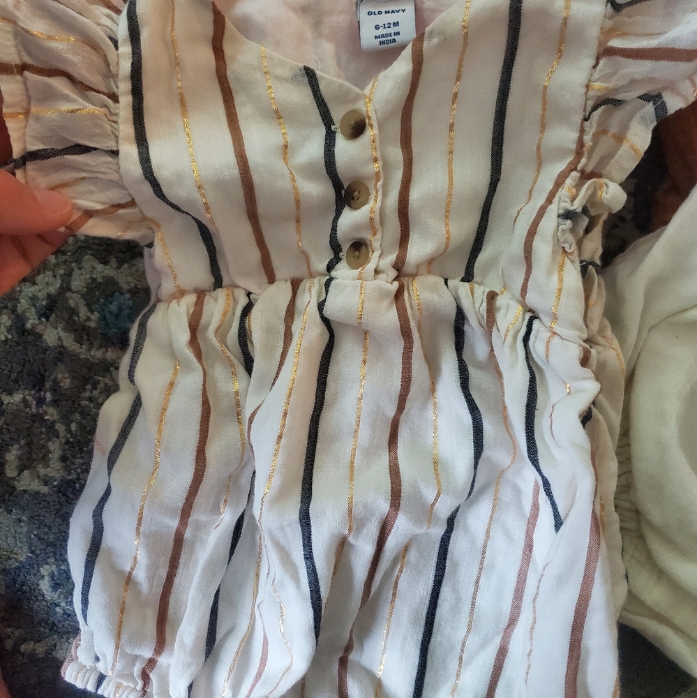 11 rompers.  Plus Two matching outfits